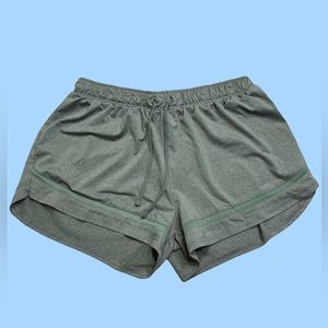 Green casual shorts with mesh detail